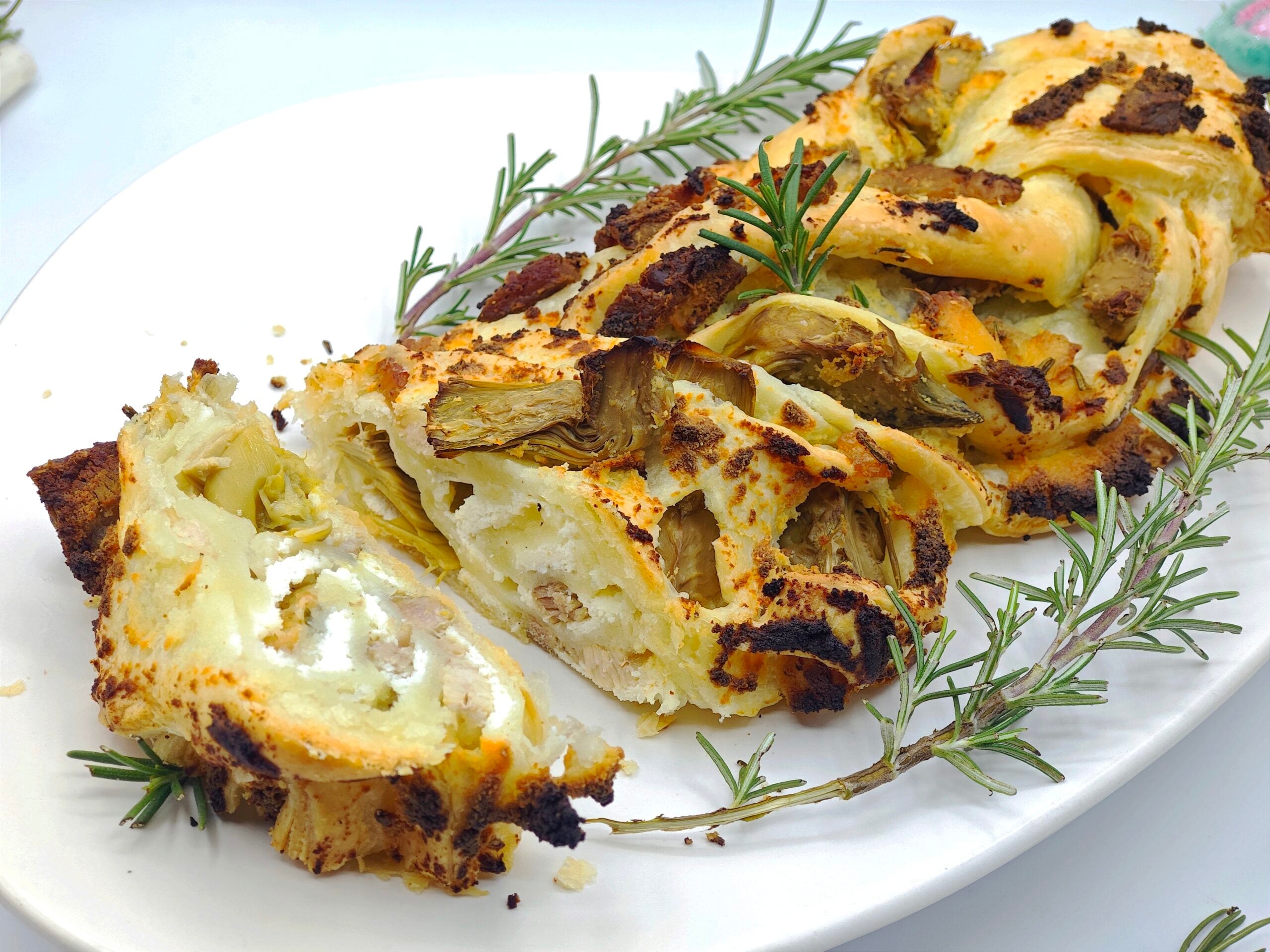 Tresse salée ricotta, artichauts et porchetta