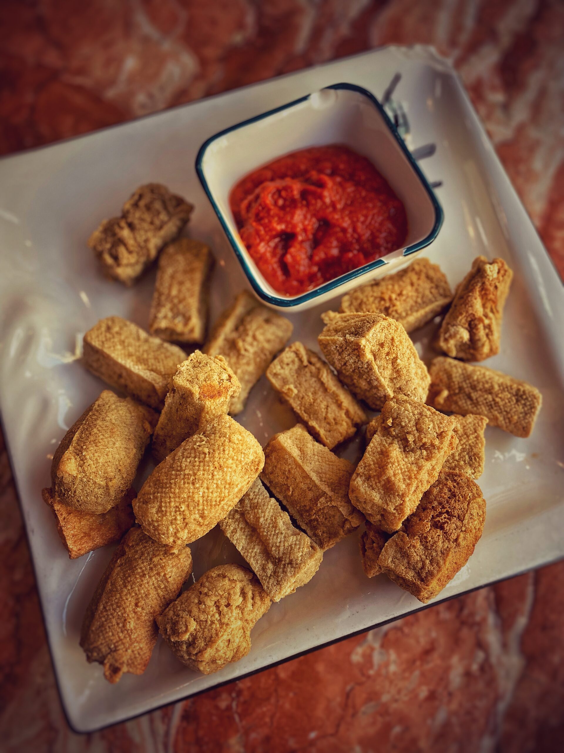 Yóuzhá chòu dòufu (Chine)