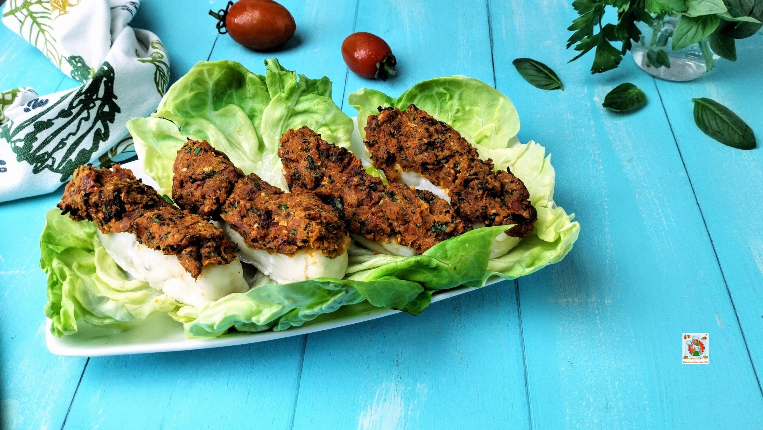 Filets de cabillaud gratinés avec tomates séchées : le plat riche en couleurs et saveurs estivales, à préparer en un clin d’œil