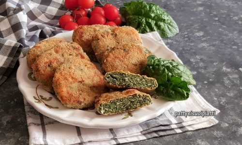 Côtelettes de poulet et épinards au four