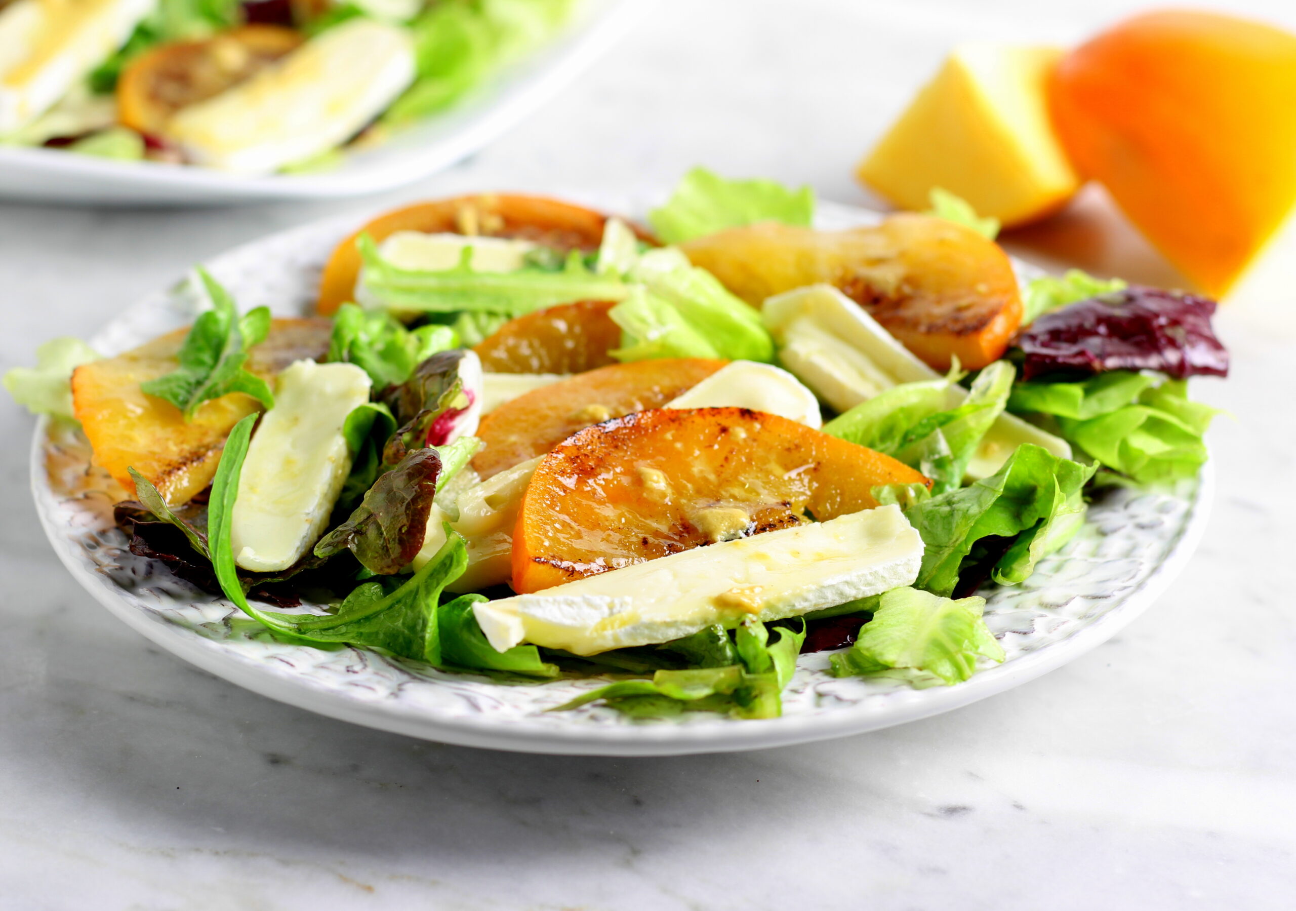Salade avec kaki pomme et tomino