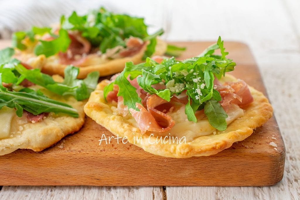 Mini-pizzas rapides roquette et parmesan