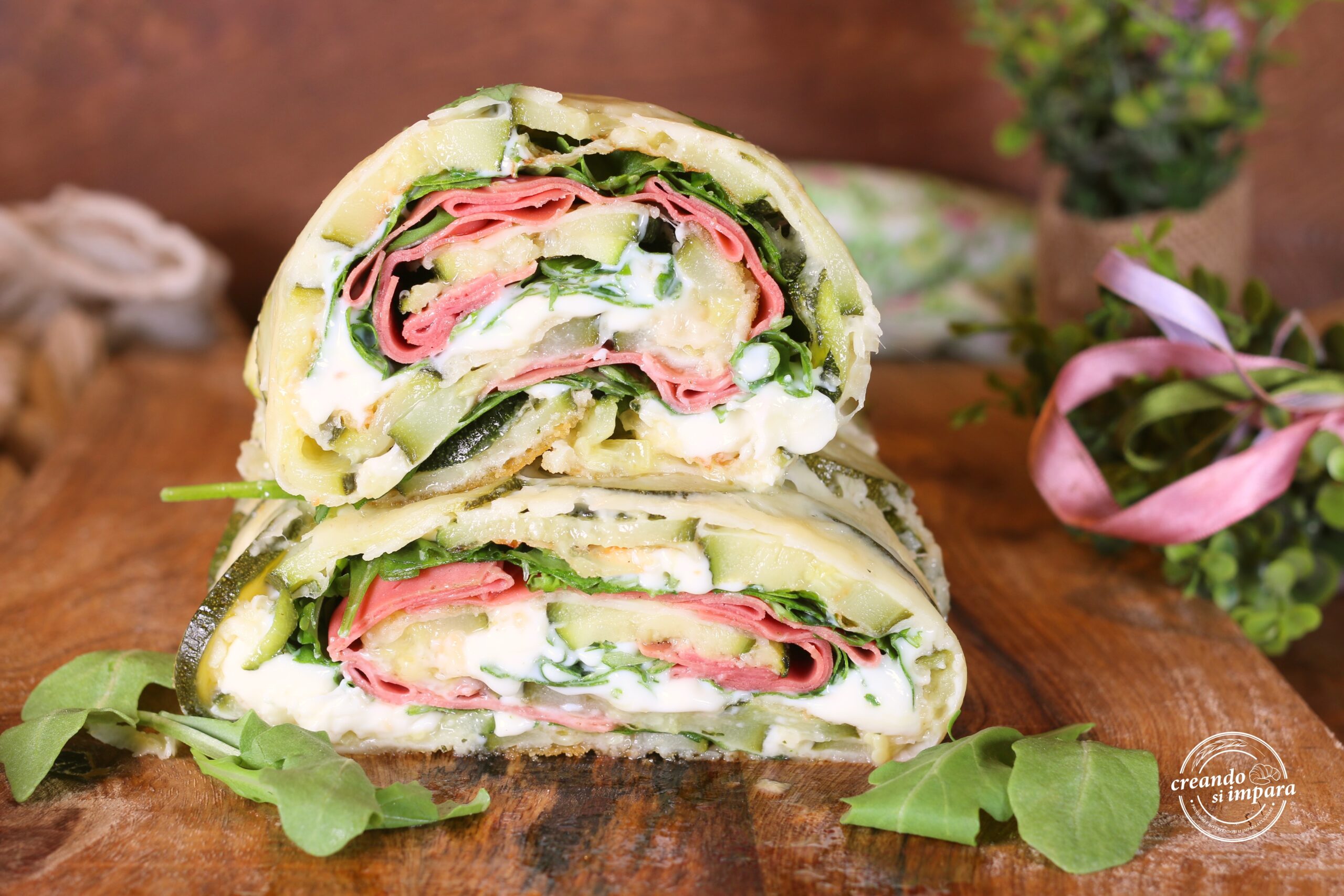 Roulé de courgettes avec roquette et stracchino