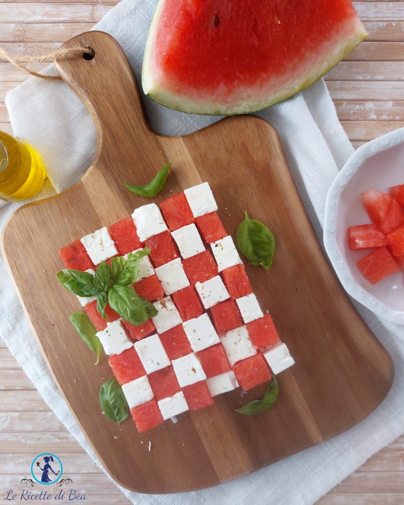 échiquier avec pastèque et fromage