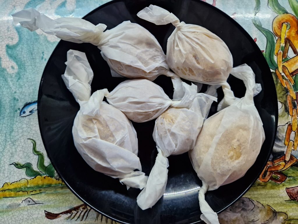 Les pommes de terre en papillote farcies