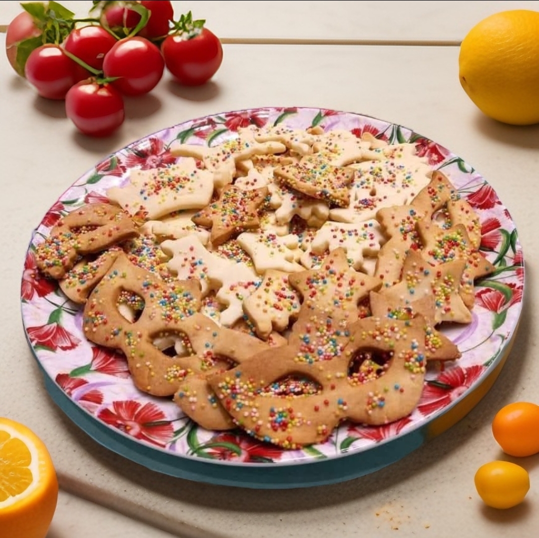 Les petits biscuits de fête avec des granulés colorés