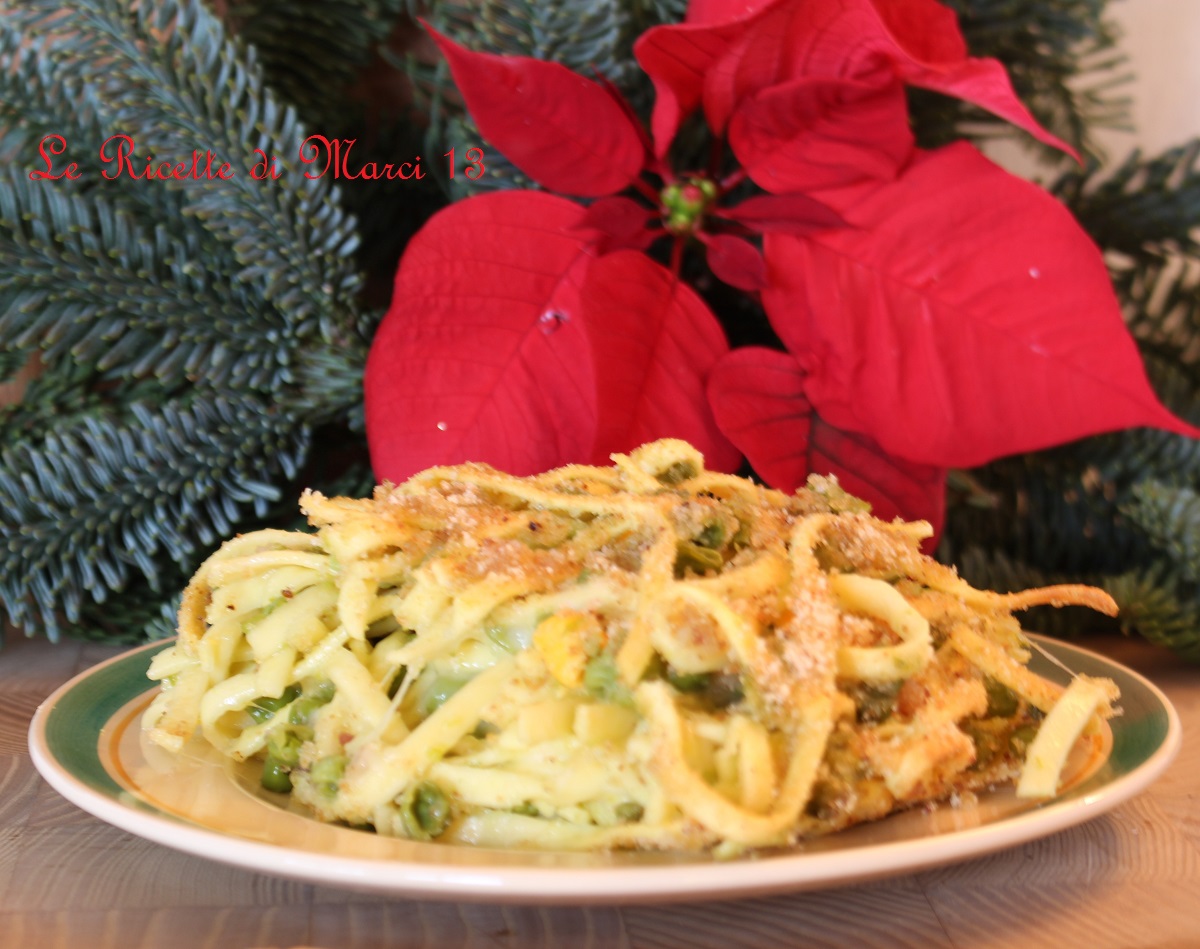 Tarte de tagliolini avec fontina et petits pois sans béchamel.