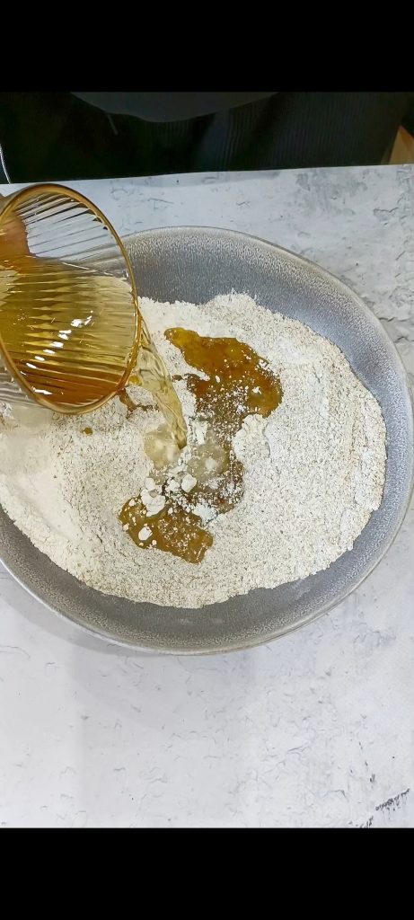 Ajoutons du vin blanc et de l'huile