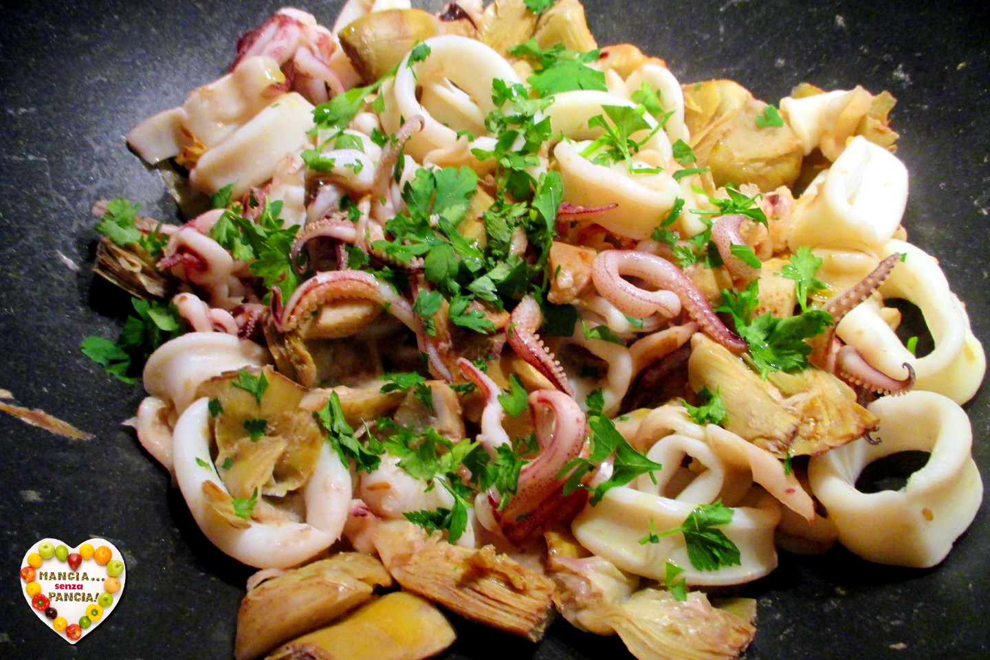 Calamari e carciofi in padella