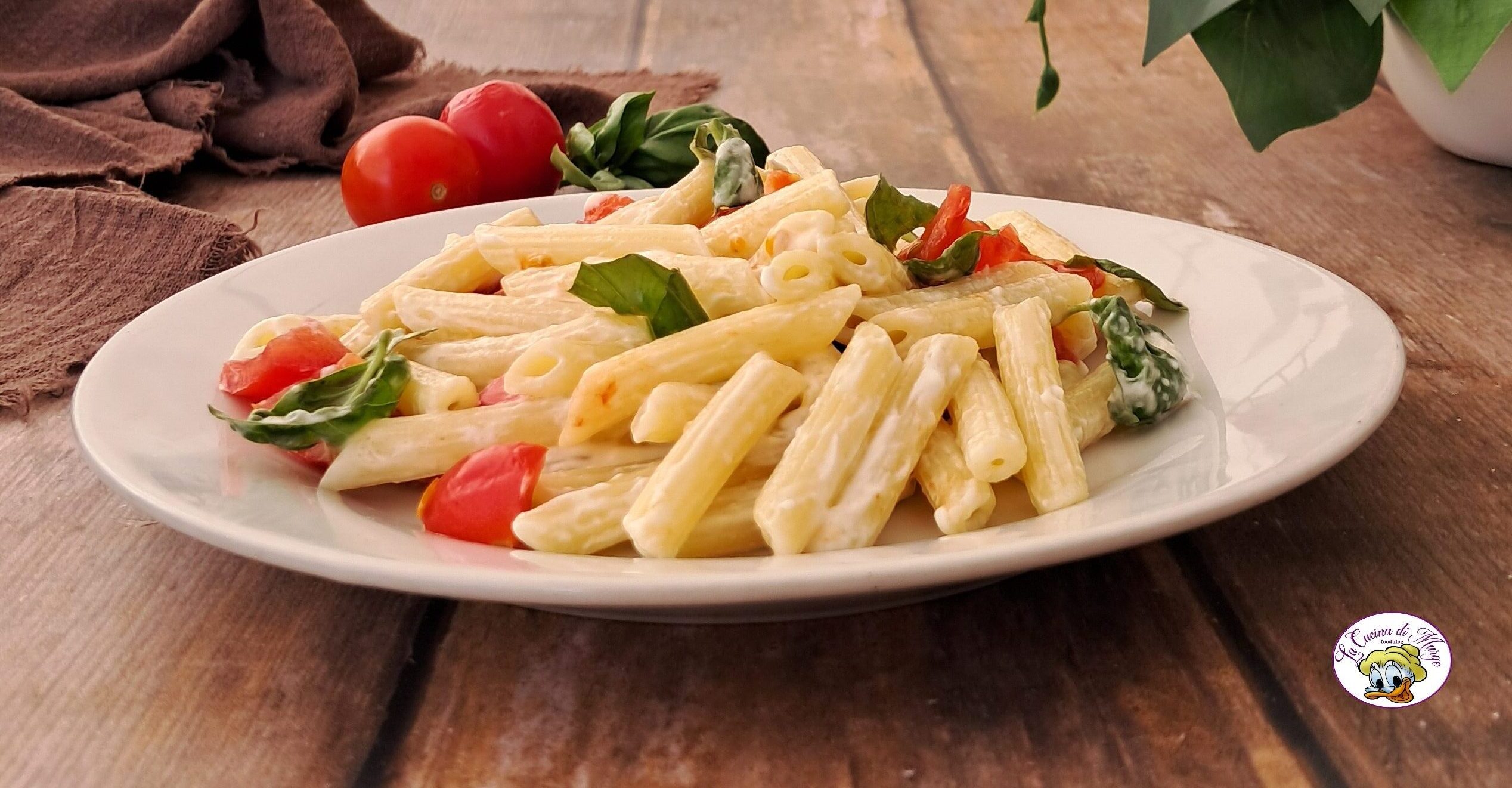 Pasta cremosa con tomatitos