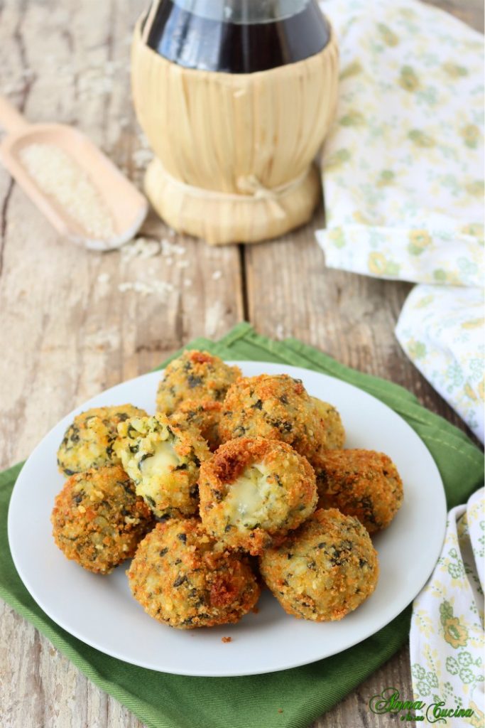 Arancini mignon con espinacas y queso