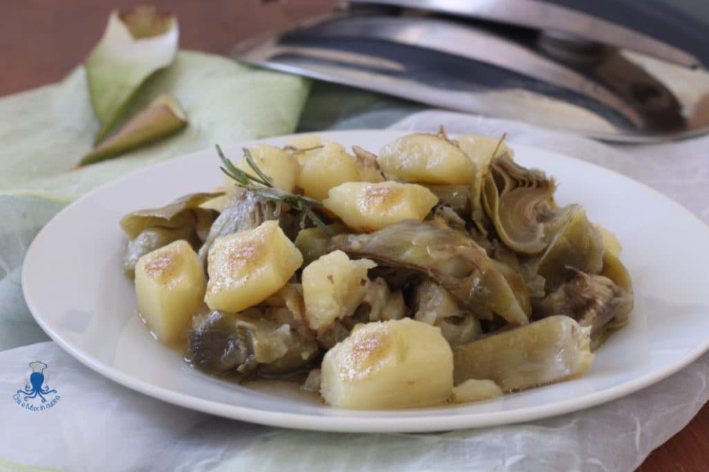 Patatas y alcachofas en olla a presión