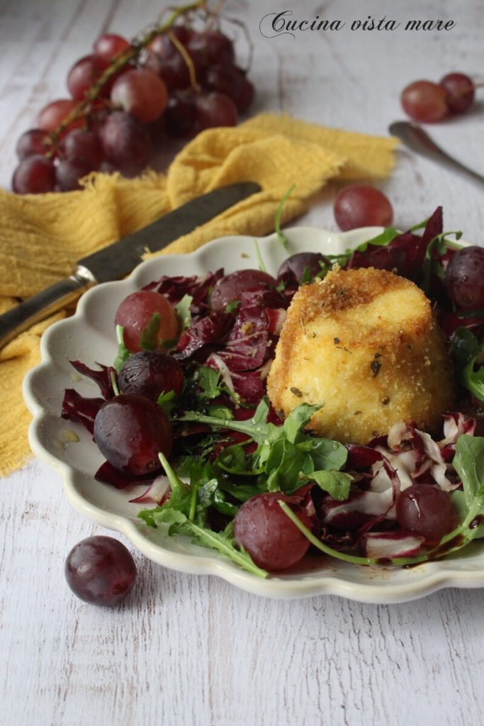 Requesón al horno con radicchio y uva Cocina vista mar
