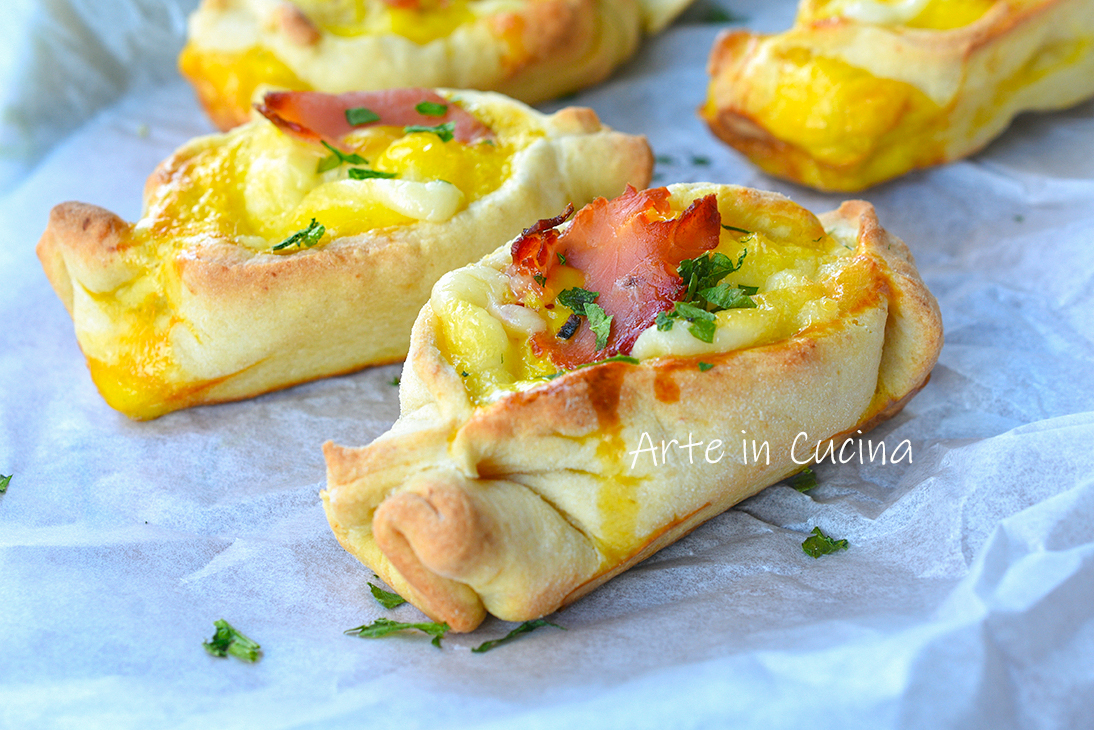 Barquillas de queso y speck