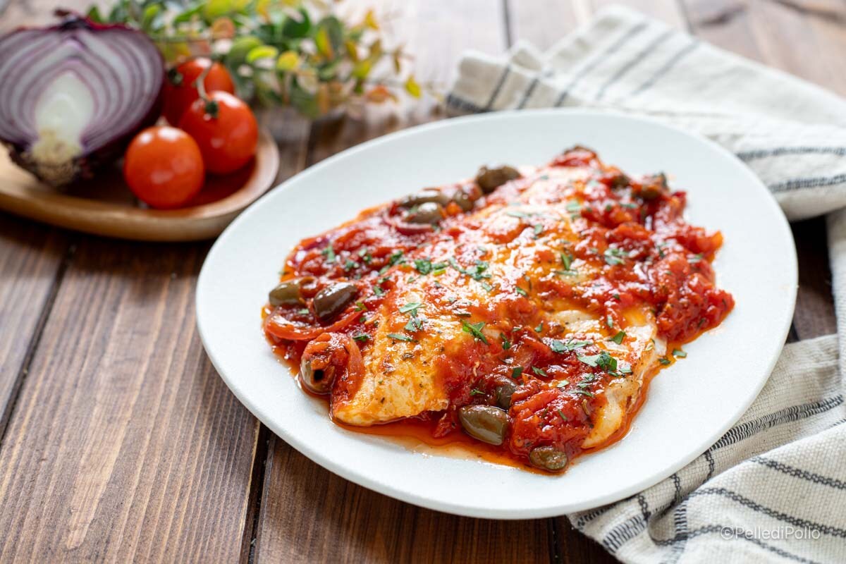 Filetes de dorada en guiso a la siciliana