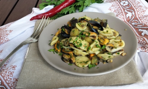 Orecchiette con berenjenas y mejillones