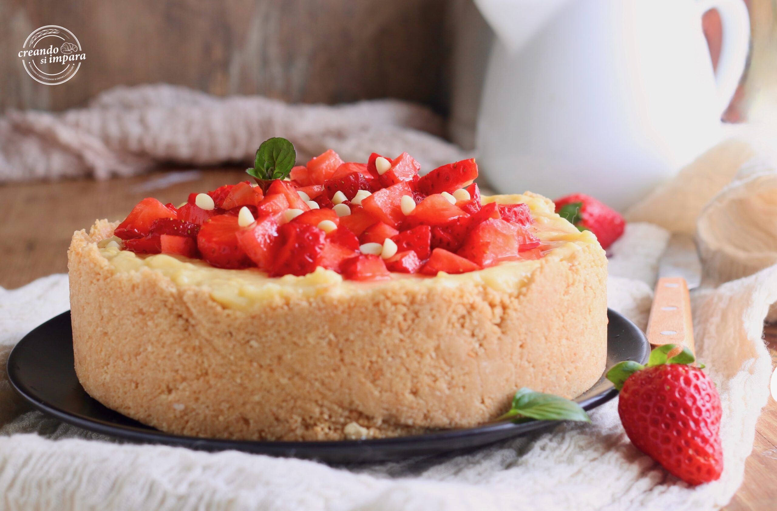 Tarta lista con crema y fresas