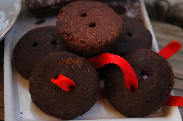 Botoncitos dulces, galletas de chocolate con glaseado