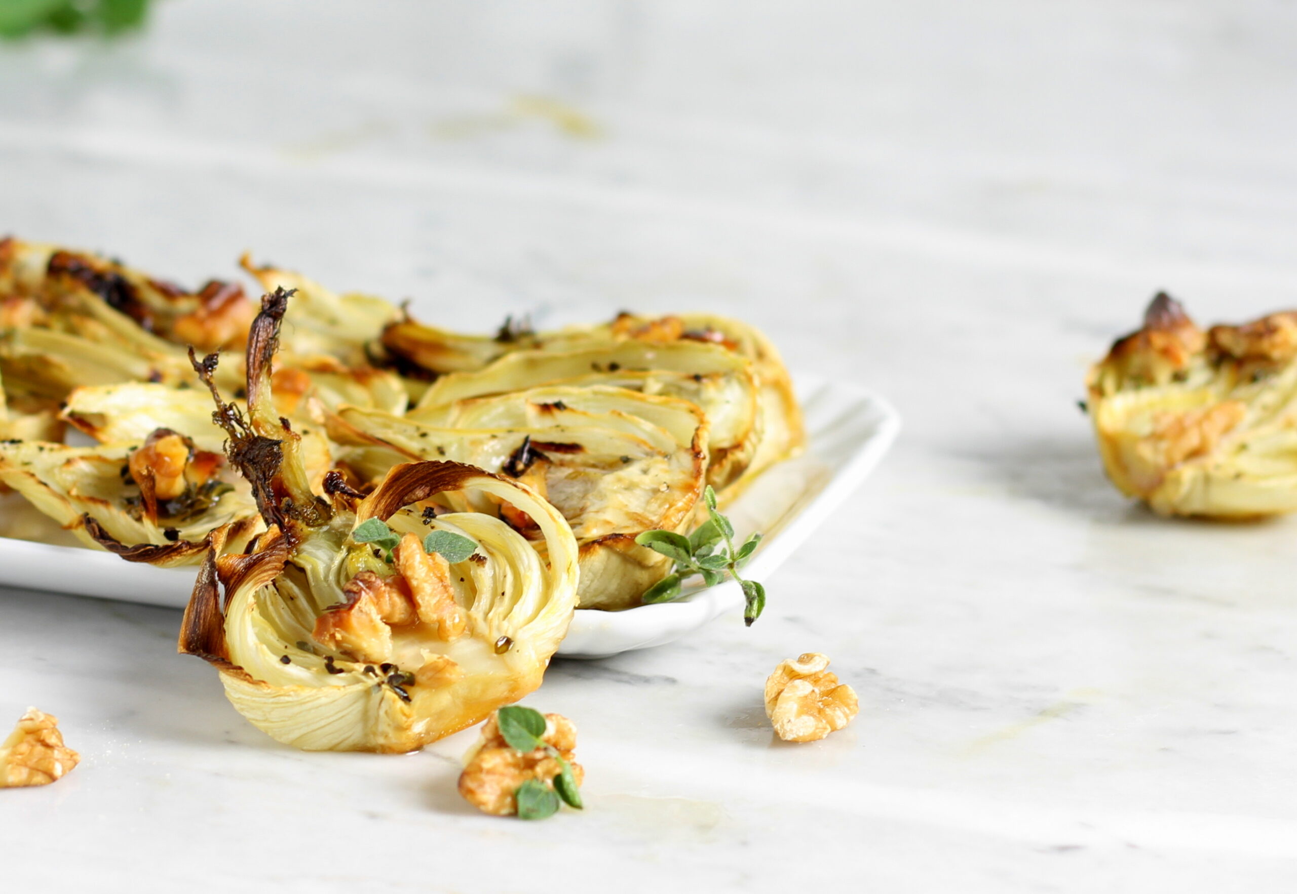 Hinojos al horno con miel y nueces