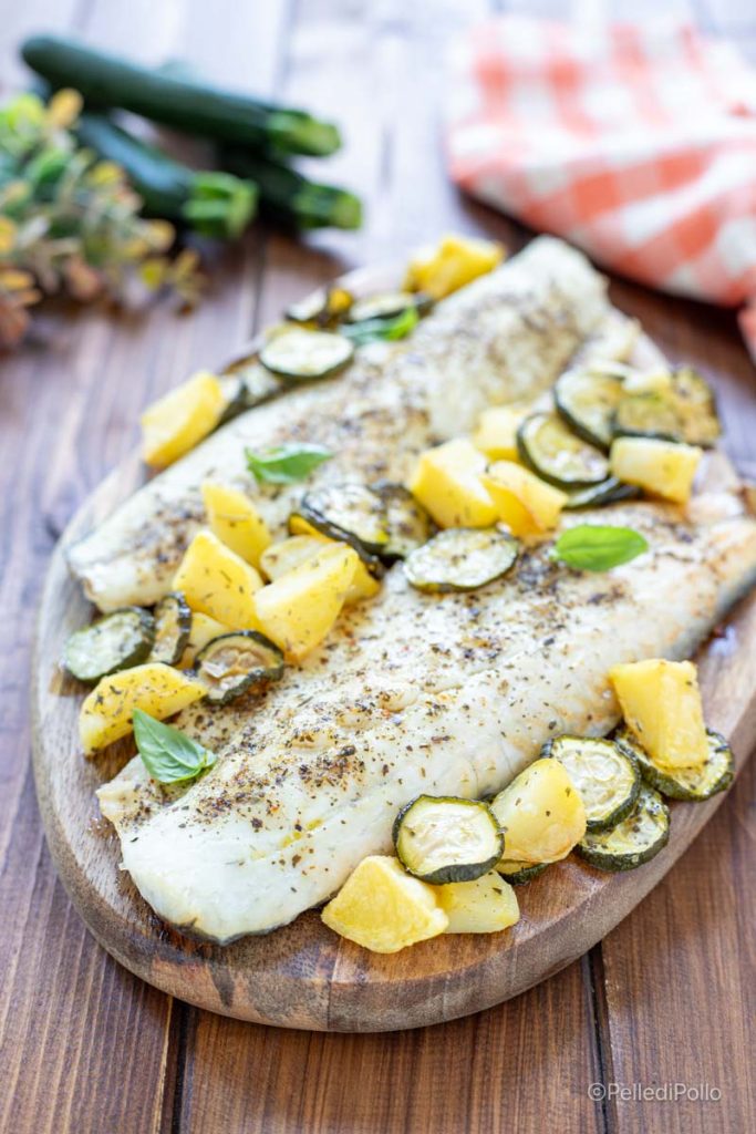 lubina al horno con patatas y calabacines