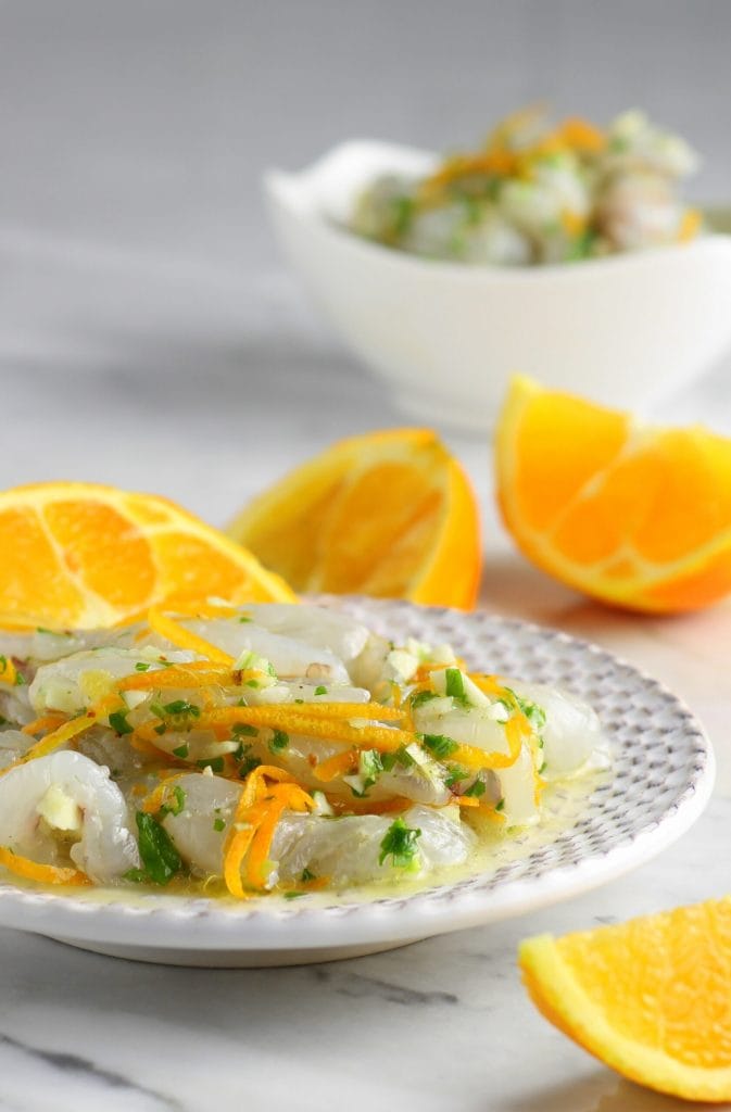 Langostinos marinados con naranja y limón