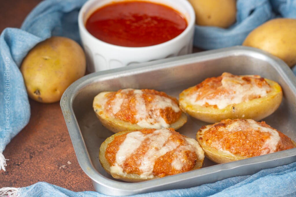 Patatas rellenas de ragú con scamorza y grana