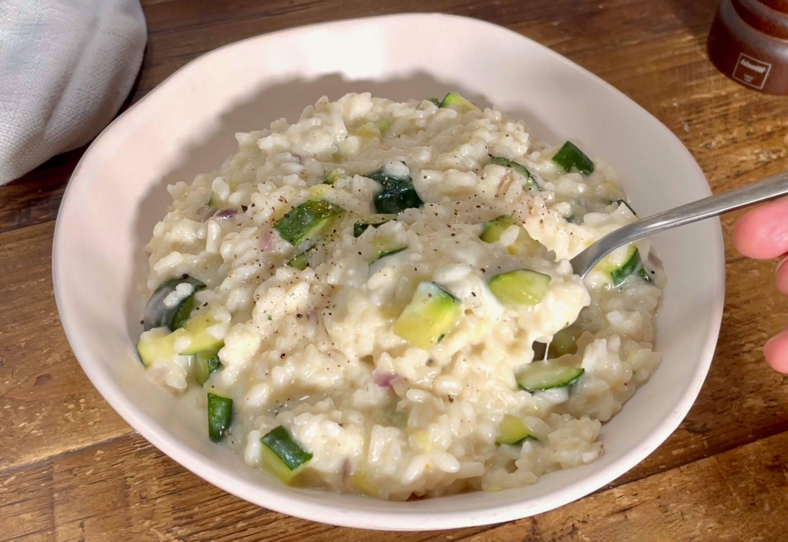 risotto cremoso con stracchino y calabacines
