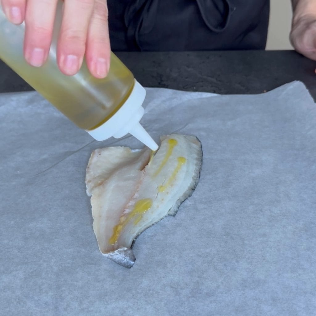 Dorada al papillote con patatas y tomatitos