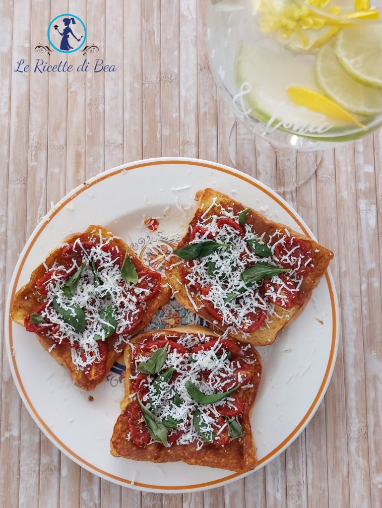 french toast con tomatitos confit y ricotta