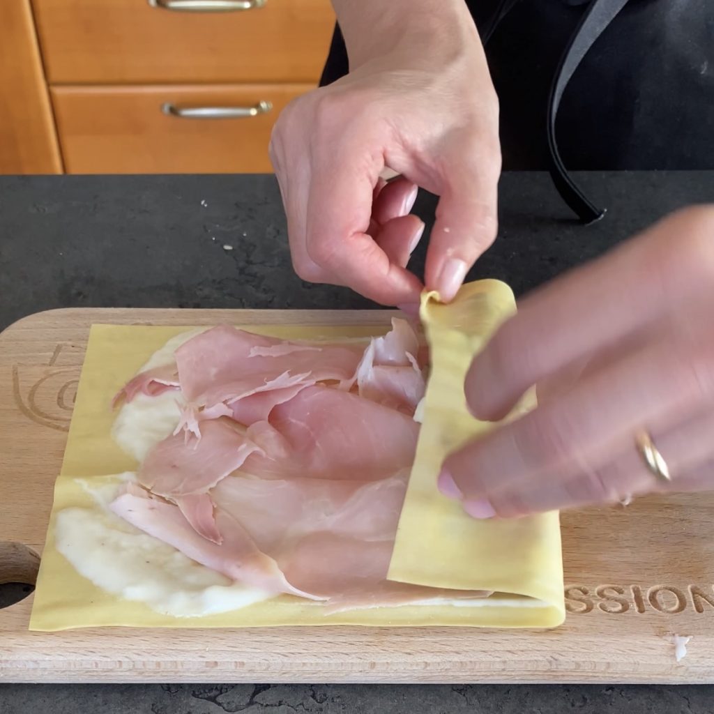 rollos de lasaña con jamón y champiñones