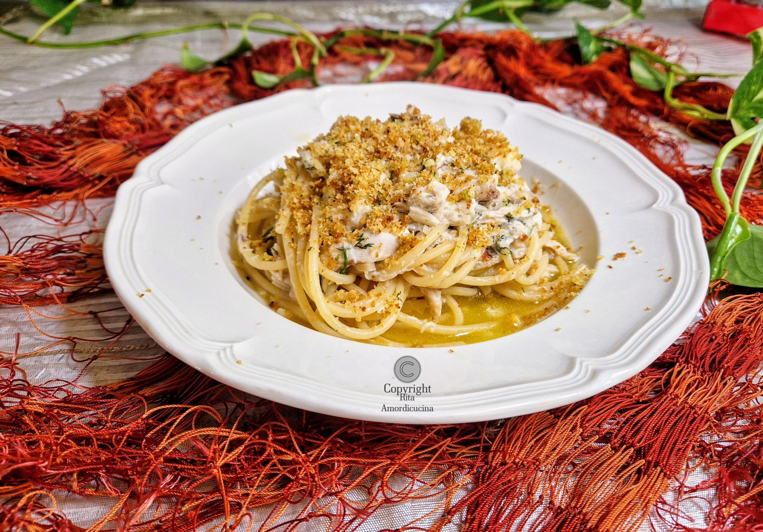 Espaguetis con pescado a la Palermitana