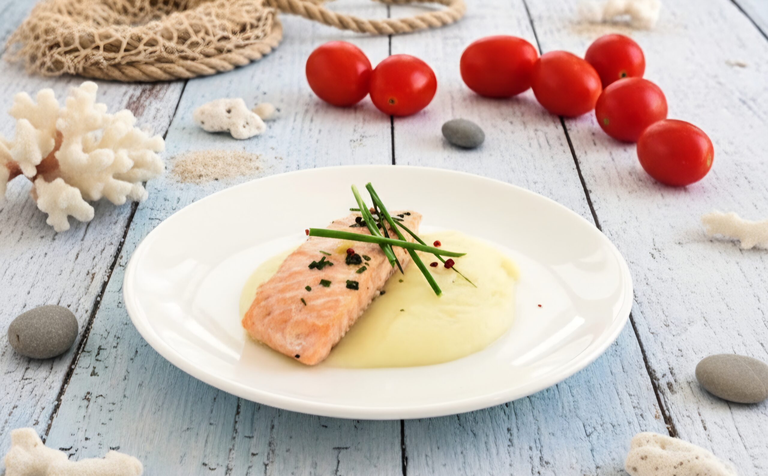 Salmón al papillote sobre crema de apionabo
