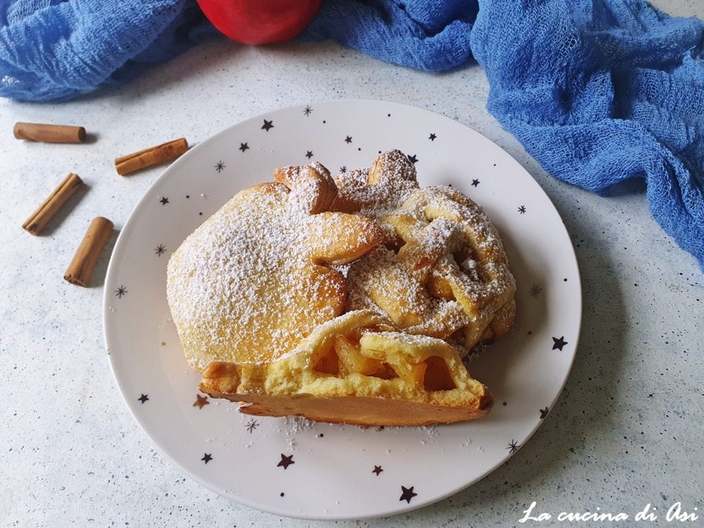 Pastelitos de masa quebrada aromatizados con canela y espolvoreados con azúcar glas
