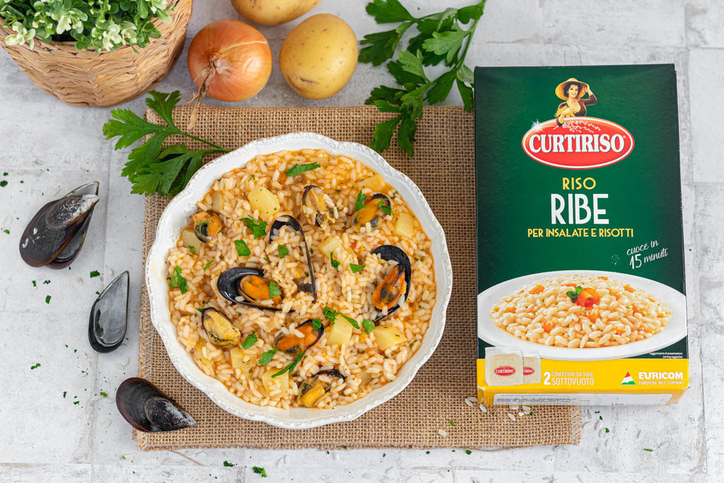 Sopa de arroz patatas y mejillones