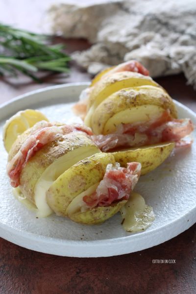 vuelve a poner en el horno las patatas hasta que el queso esté derretido