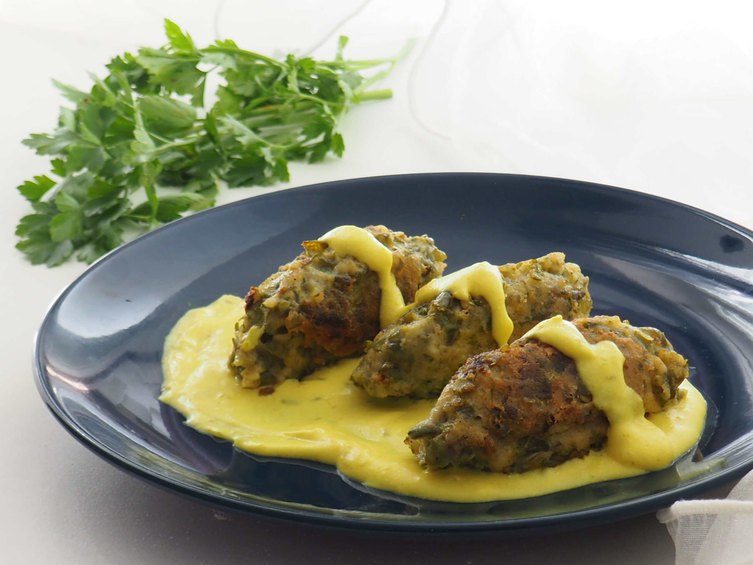 Quenelles de judías verdes con crema a la cúrcuma