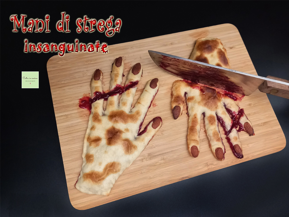Manos de bruja ensangrentadas