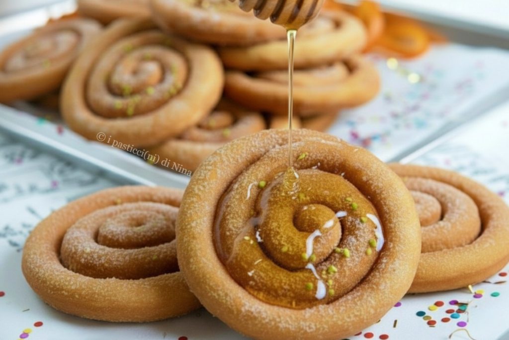 frisjole sardas en espiral buñuelos largos dulces de Carnaval tradicionales los pasteles de Nina
