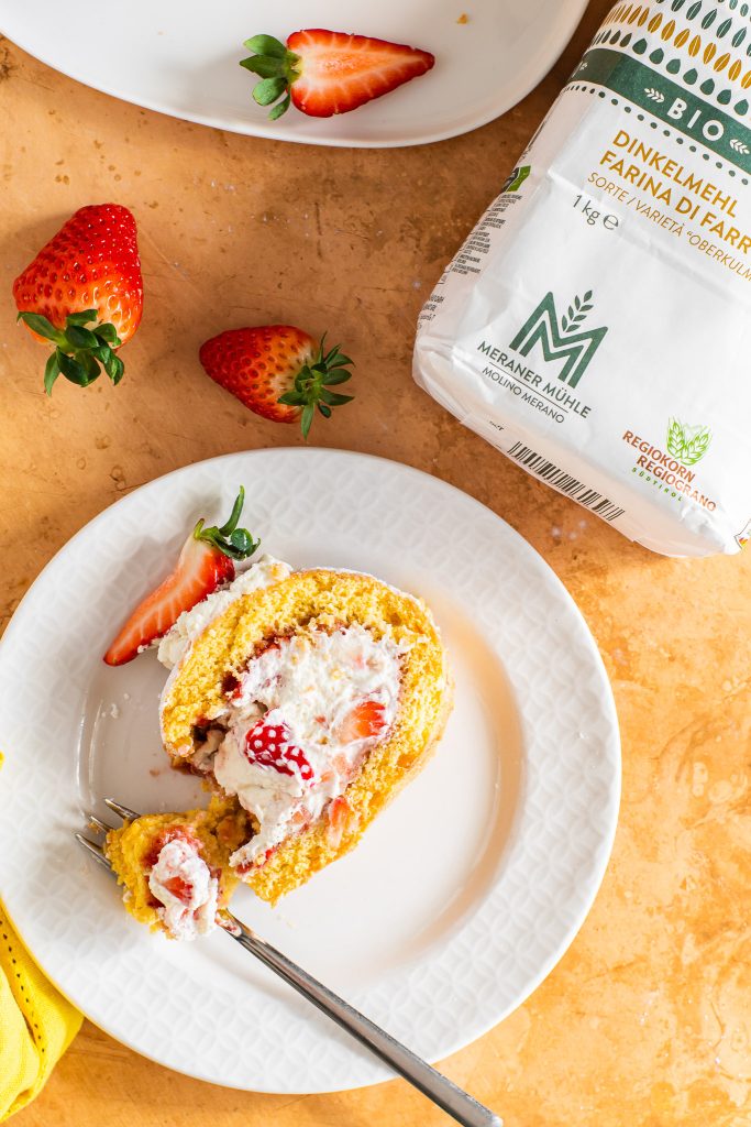 Brazo de nata y fresas