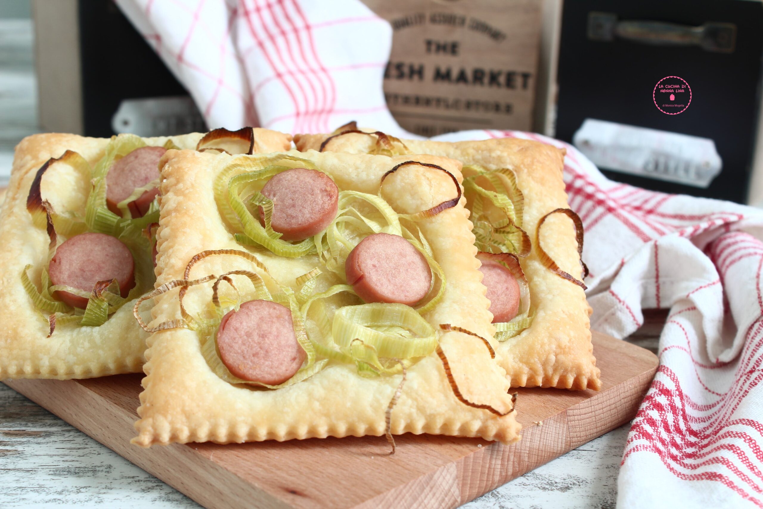 Pizzinhas de alho-poró e salsicha