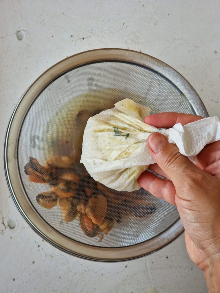 Massa com creme de batata e mexilhões