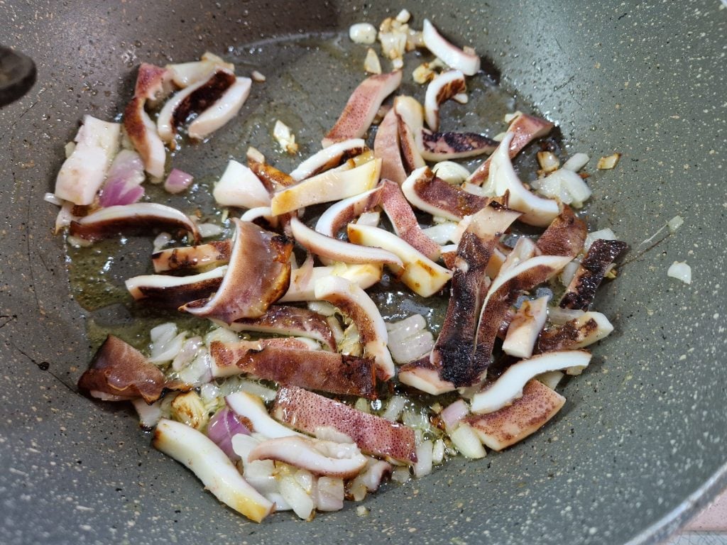 Lulas com legumes salteados