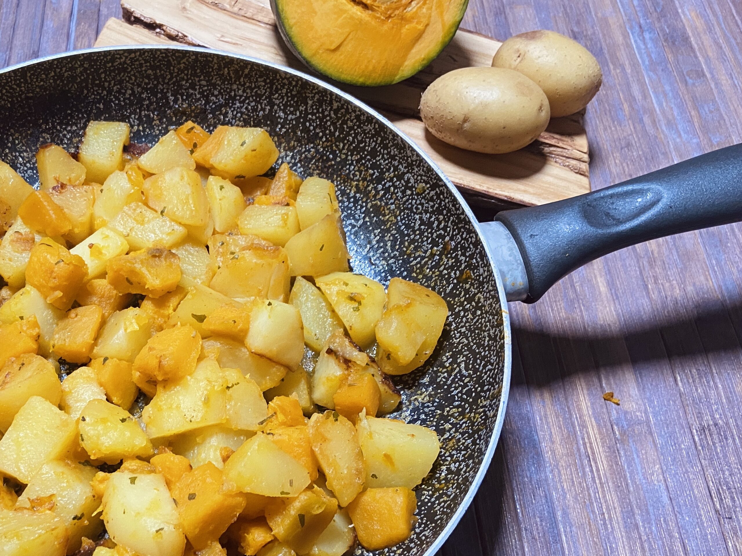 Abóbora e batatas na panela