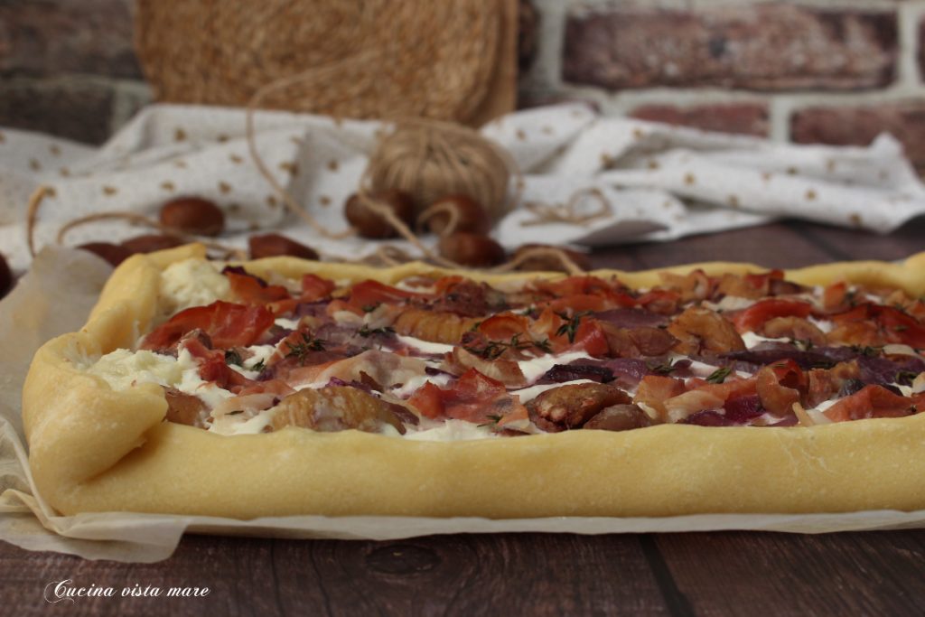 Torta rústica de castanhas, cebolas e speck Cozinha vista mar