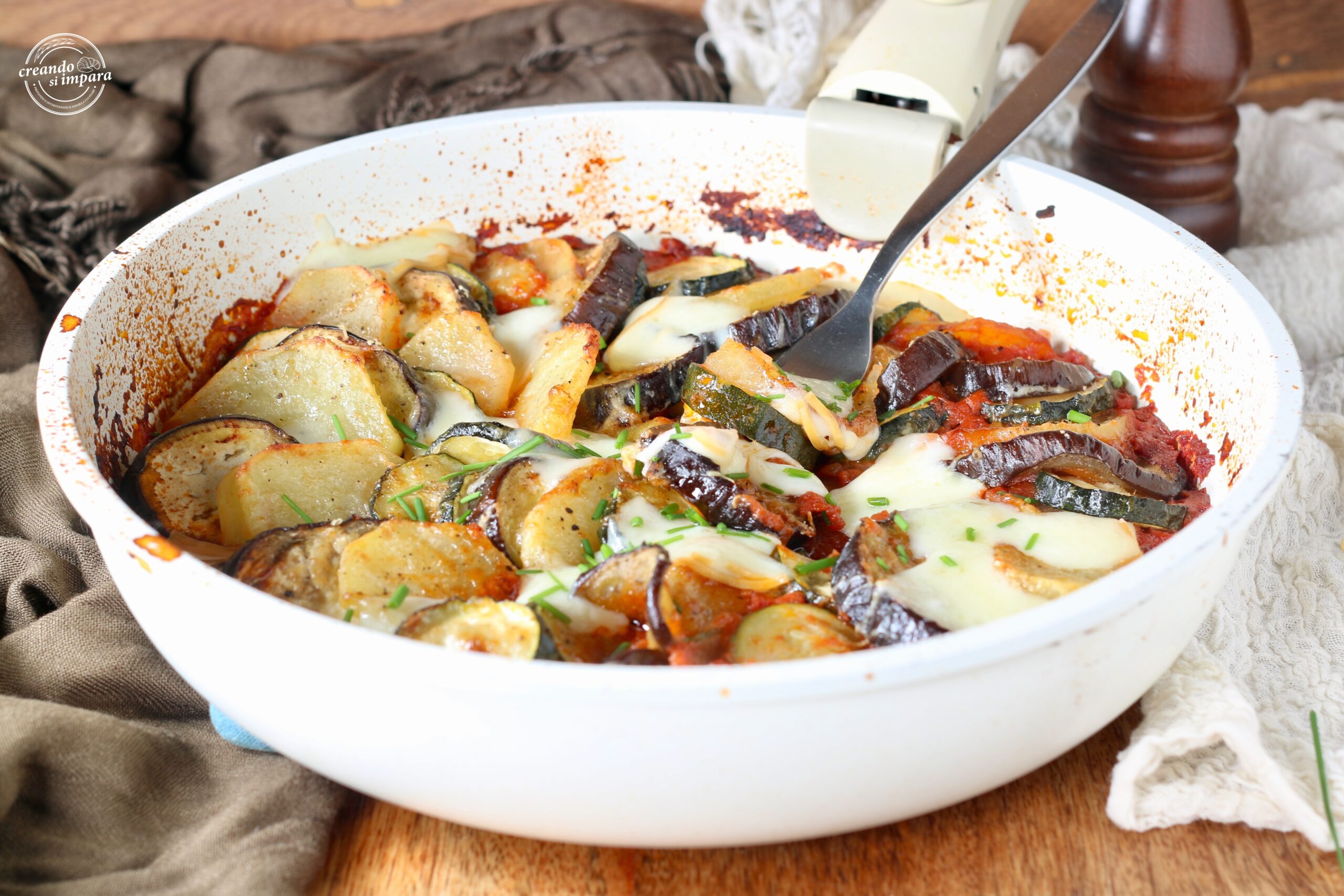 Travessa de legumes assados gratinados