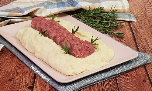 Cotechino fresco com purê de batatas