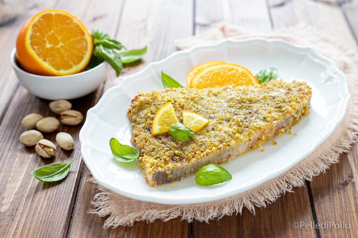 Peixe-espada com laranja e pistache