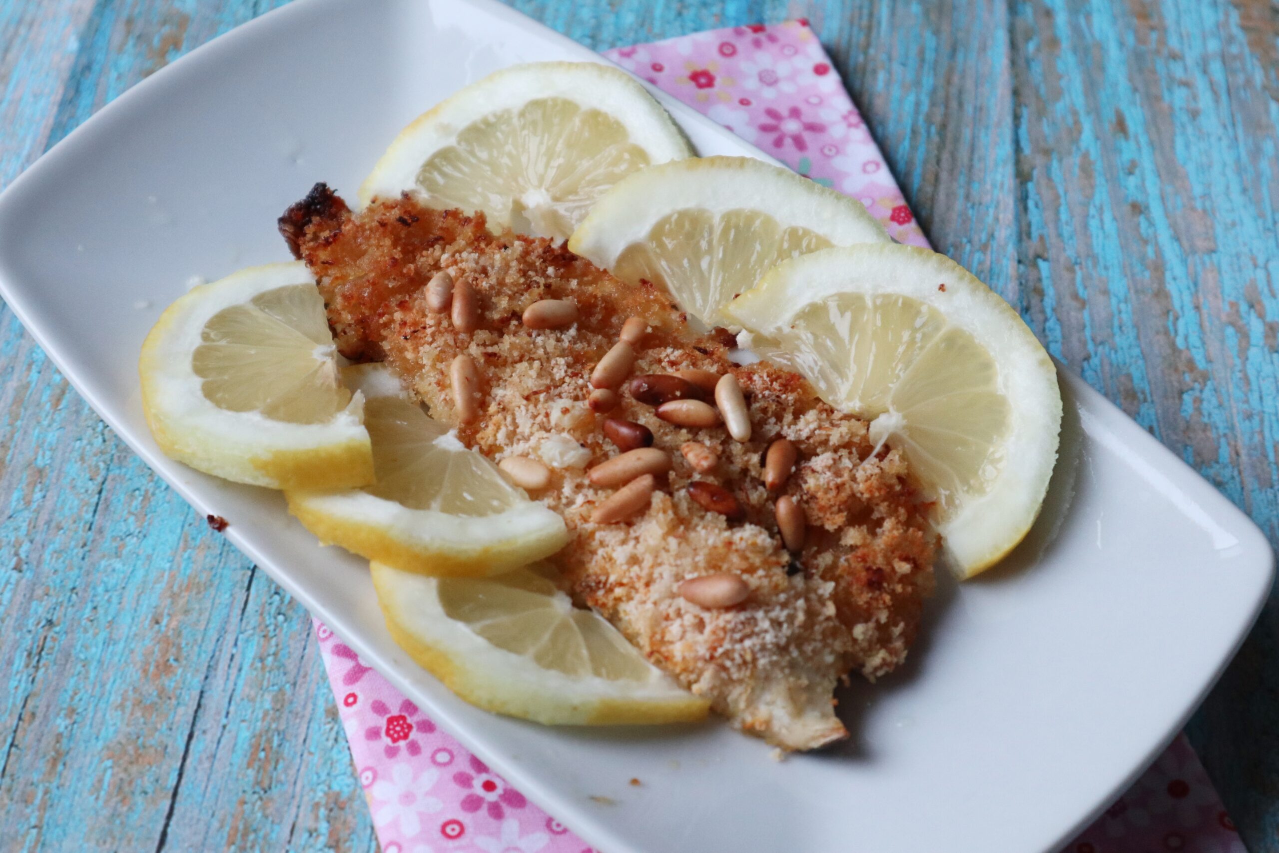 Robalo ao limão com pinoli