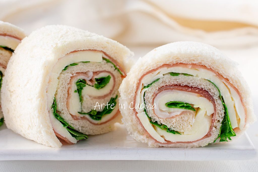 Rolinhos de pão speck e rúcula entrada