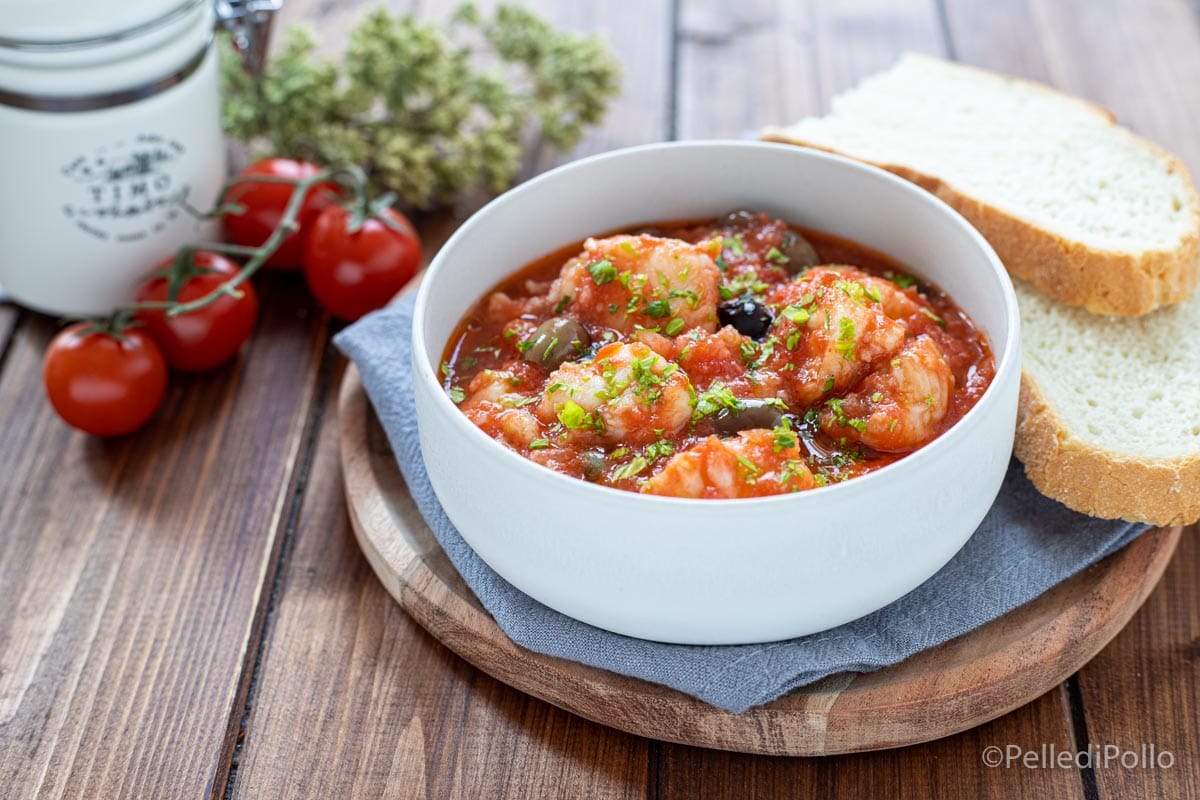 Tamboril ensopado com tomate e azeitonas
